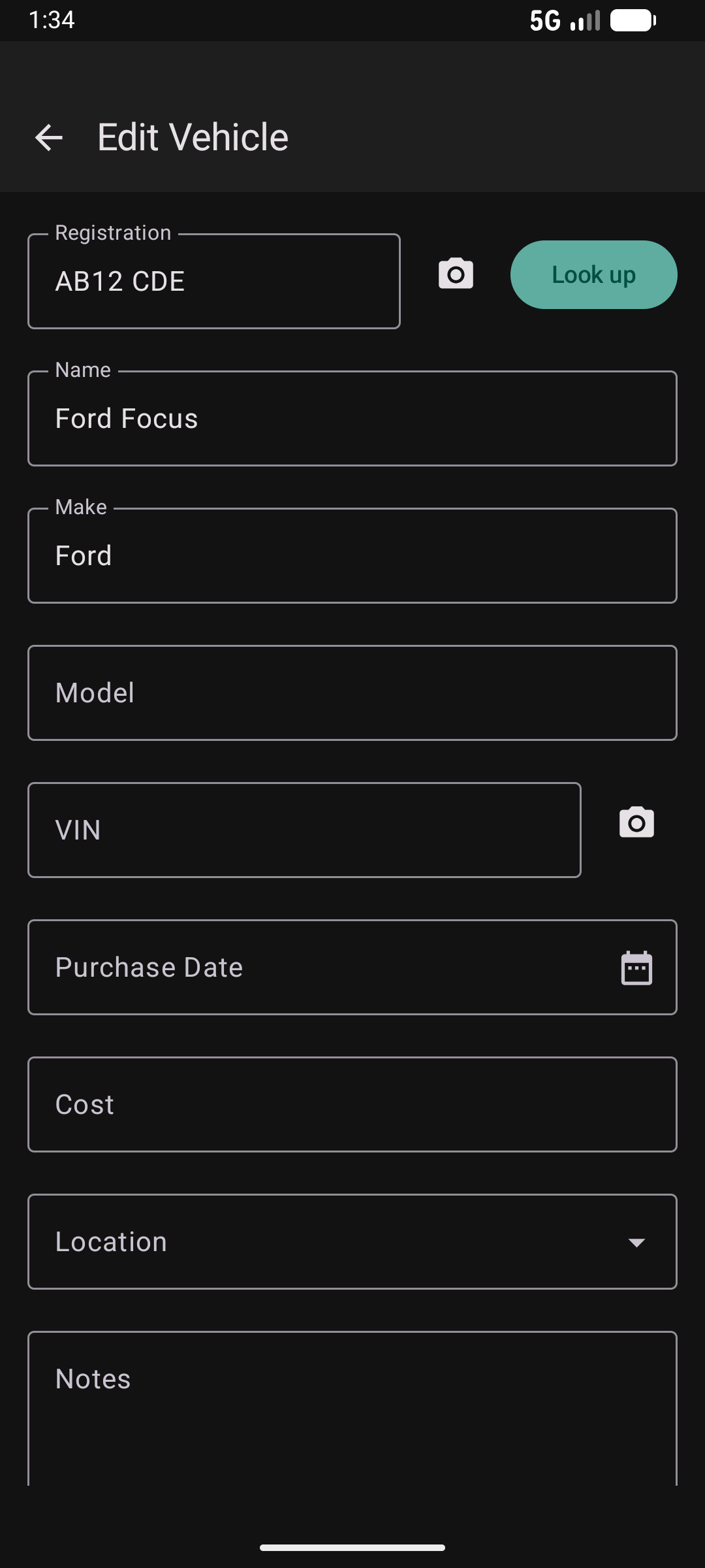 Vehicle edit screen top in dark mode with registration and make