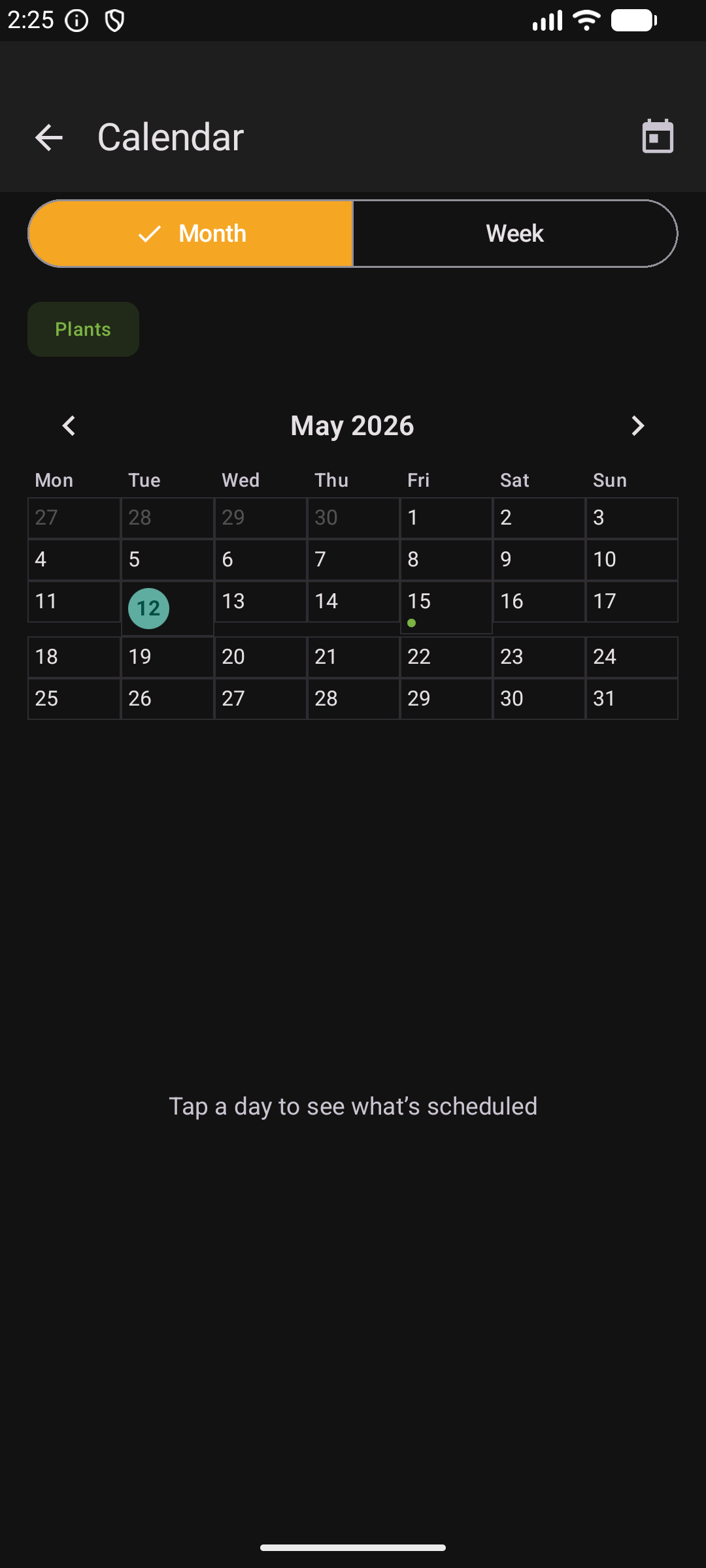 Calendar in dark mode showing May 2026 month view with a Plants filter