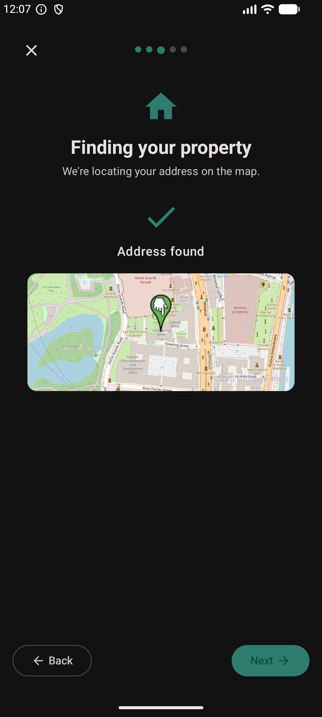 Property wizard step 3 — address found and placed on map with green checkmark